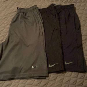 Three pair Nike basketball shorts. Medium